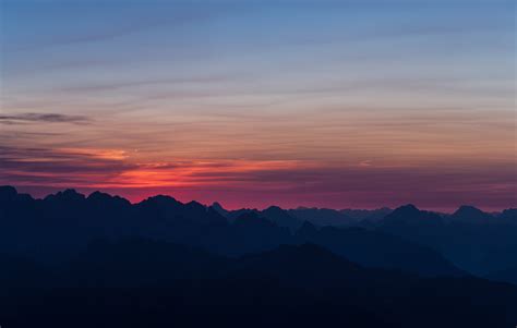 Mountains Sunset Sky Horizon Wallpaper