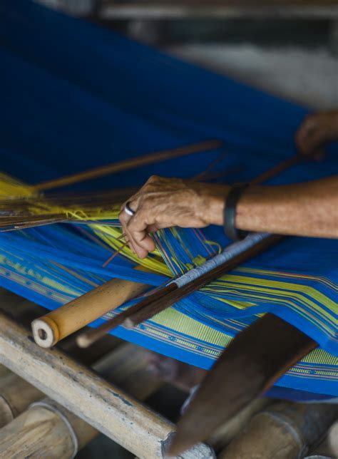 Person Weaving a Mat · Free Stock Photo