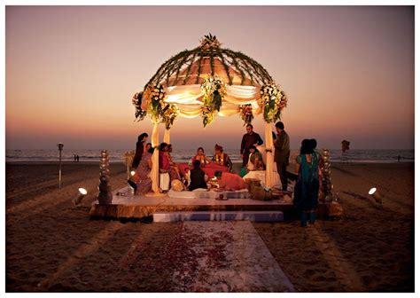 45. Shilpa and Shiven | Sunset beach weddings, Indian beach wedding, Beach wedding decorations