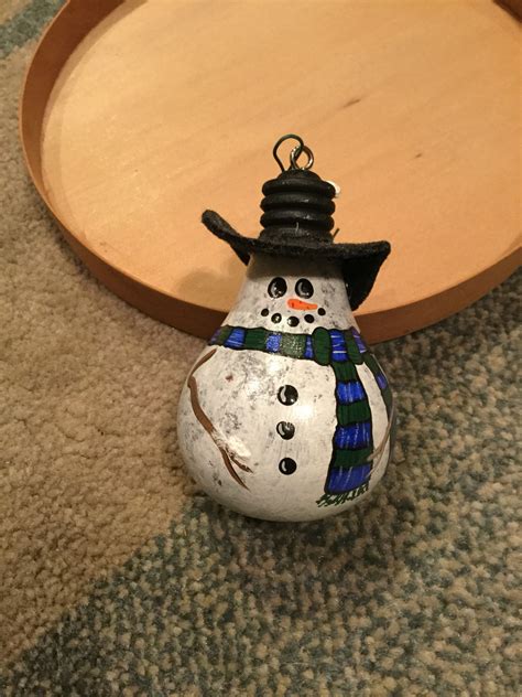 Snowman | Light bulb ornaments, Christmas bulbs, Wooden light