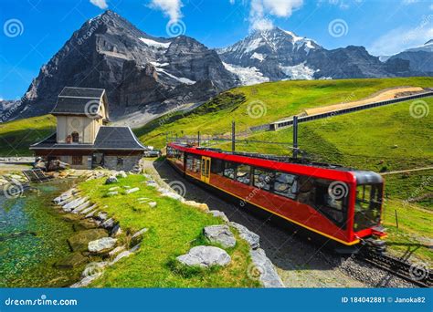 Cogwheel Tourist Train Coming Down from the Mountain, Jungfraujoch, Switzerland Stock Image ...