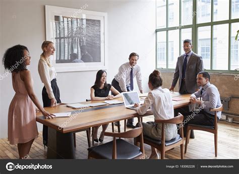 Young Professionals Table Business Meeting — Stock Photo © monkeybusiness #183062226