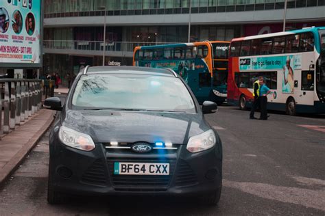 Do you have to stop for an unmarked police car?