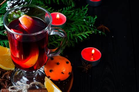 Premium Photo | Mulled wine for christmas eve celebration party by tree.