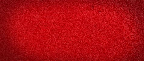 Wide panorama red wall texture for background with copy space for ...