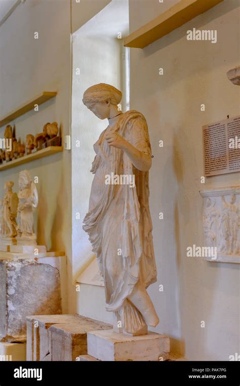 EPIDAURUS, GREECE -APR 24, 2016: Statue at the Archaeological museum in Epidaurus, Greece ...