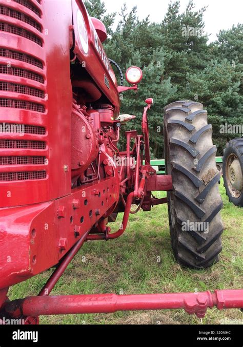 Vintage red tractor Stock Photo - Alamy