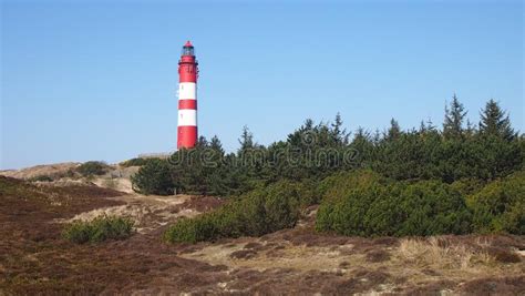 Lighthouse at Amrum stock image. Image of dunes, background - 147897325