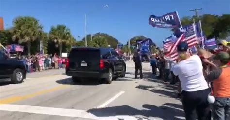 Trump drives by supporters' rally in West Palm Beach - CBS News