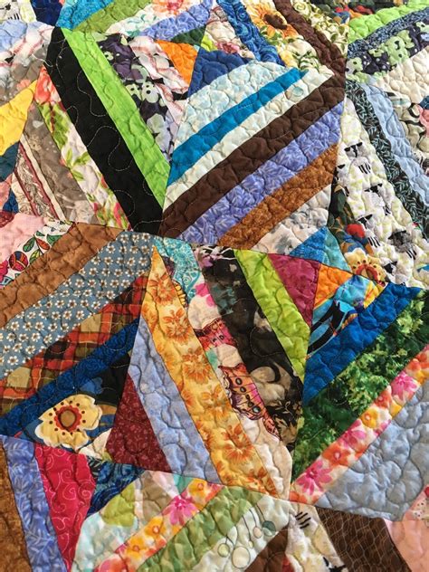 PamelaQuilts: Friday Finishes - Scrappy Strip quilt!