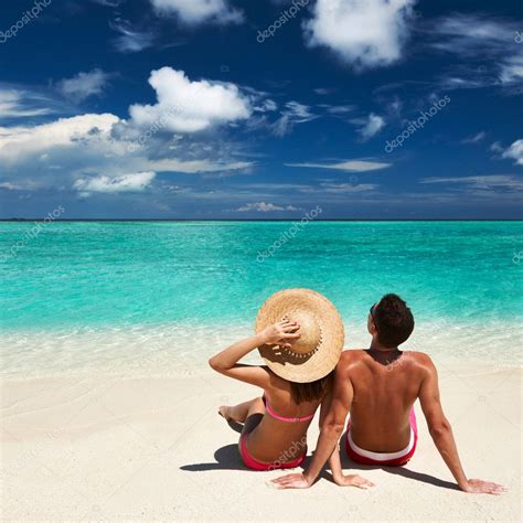 Couple on a beach at Maldives Stock Photo by ©haveseen 21611147