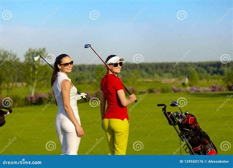 Two Pretty Women Golfers Walking and Talking at Golf Course Stock Photo - Image of game, people ...