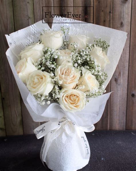 White Rose Bouquet in 2024 | White rose bouquet, White flower bouquet ...