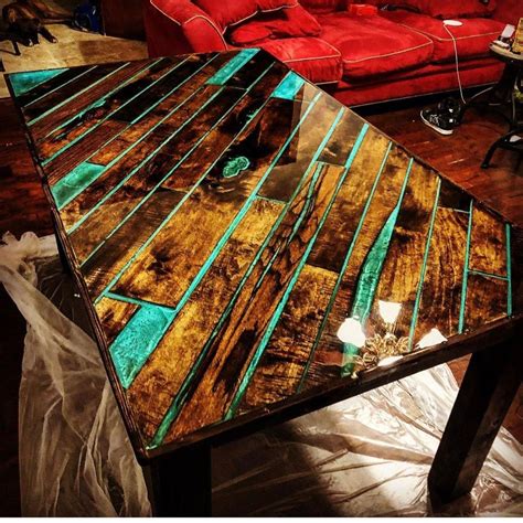 Epoxy and wood plank dinner table | Etsy | Diy resin wood table, Diy ...