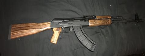 Put new wood furniture on my WASR-10. Looks great, feels even better. (Both gun and mag are ...