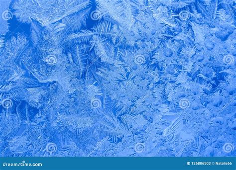 Frosty Blue Icy Pattern on Winter Window As Background. Stock Image ...