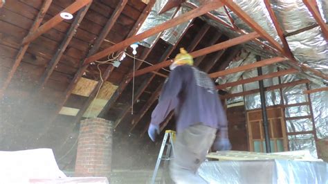 Time lapse attic insulation removal - YouTube