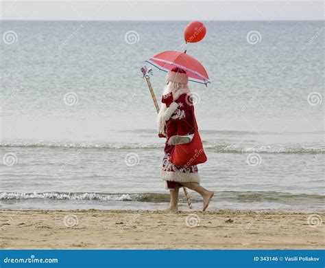 Santa Claus On The Beach Royalty Free Stock Image - Image: 343146