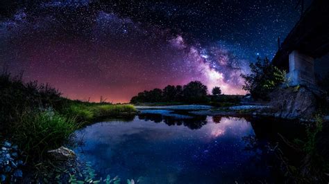 Milky Way above the lake wallpaper - backiee