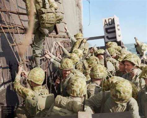 USMC Marines boarding landing craft during the Battle of Peleliu September-November 1944 ...