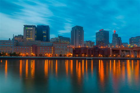 Downtown St. Paul, Minnesota at night reflected on the Mississippi River. Photographed from ...