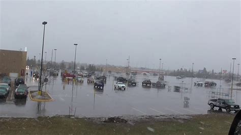 Small Spring Snow Storm Looking At Walmart Parking Lot!! Weather Alpena ...