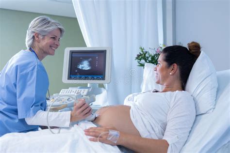 Doctor Doing Ultrasound Scan for Pregnant Woman in the Hospital Stock Image - Image of ...