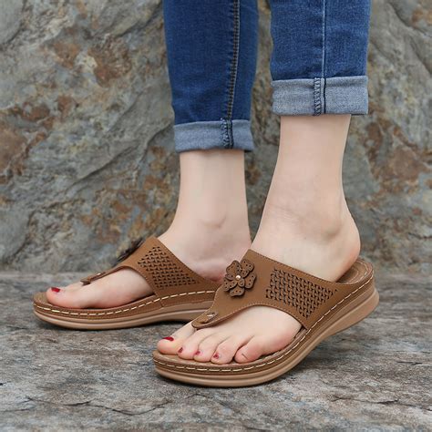 LOSTISY Women Hollow Out Flip Flops Beach Casual Sandals | Alexnld.com