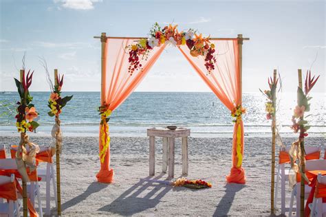 Orange tropical beach wedding. | Tropical beach wedding, Beach wedding pink, Beach wedding planner