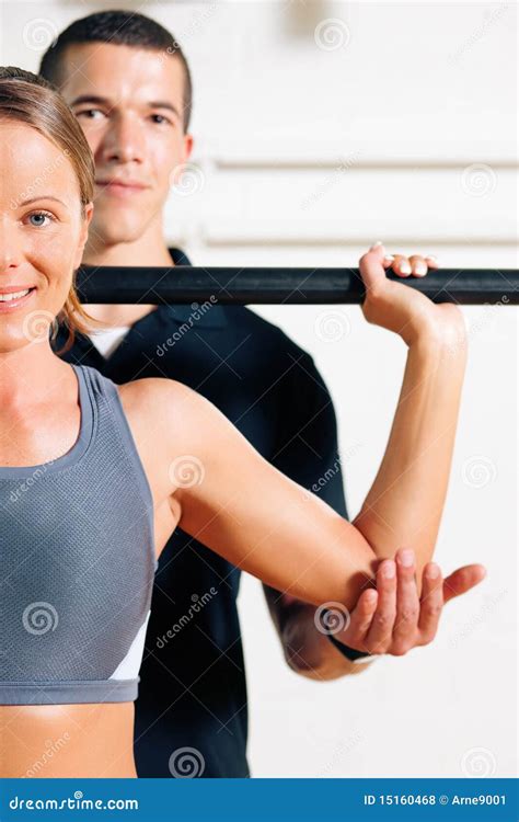 Personal Trainer In Gym Royalty Free Stock Photos - Image: 15160468