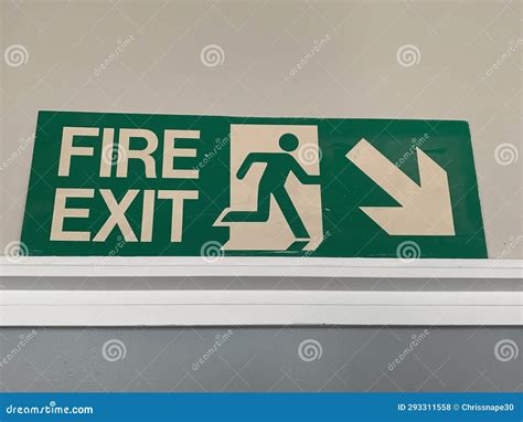 UK Green and White Fire Exit Sign Stock Photo - Image of assembly, font: 293311558