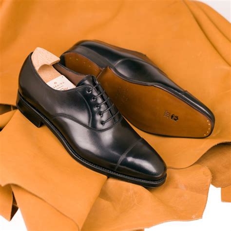 Carmina shoemaker - Our cap toe Oxfords 80386 in black Shell Cordovan... | Oxford shoes, Leather ...