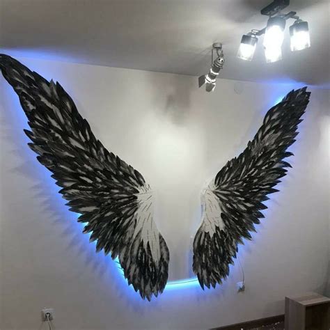 "Unusual volumetric wings with LED backlighting\nGiant angel wings backdrop-outdoor event ...