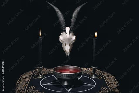 Altar for satanic rituals. Witchcraft composition with goat skull ...