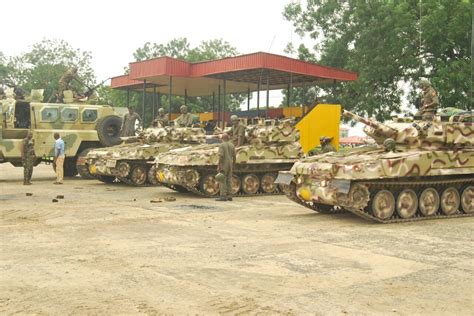 Nigerian Army Scorpion Light Tanks and MRAP's at a base camp vehicle ...