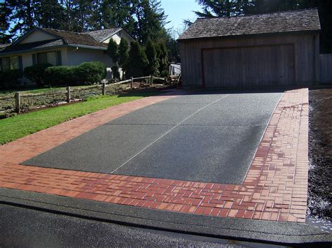 brick framed concrete driveway | Driveway design, Brick driveway ...