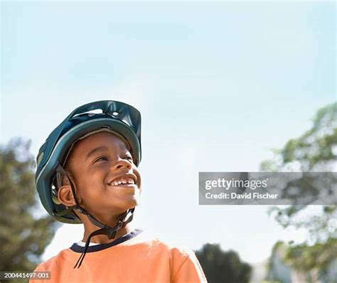 Boy Riding Bike Helmet Photos and Premium High Res Pictures - Getty Images