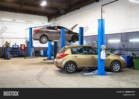 Car On Lift Mechanic Image & Photo (Free Trial) | Bigstock