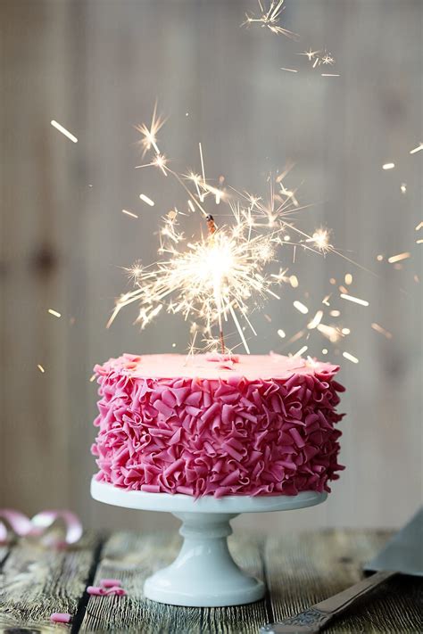 Pink Celebration Cake With Sparkler | Stocksy United | Birthday cake ...