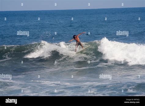 Surfing in El Zonte, La Libertad, El Salvador Stock Photo - Alamy