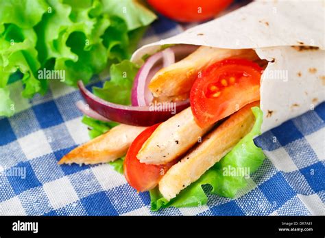 Chicken kebab wrap Stock Photo - Alamy