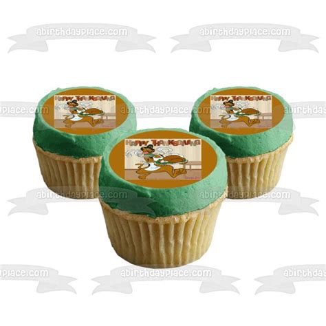 three cupcakes with green frosting and an image of a dog on them