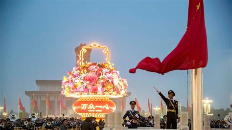 Beijing holds flag-raising ceremony on China's National Day - CGTN