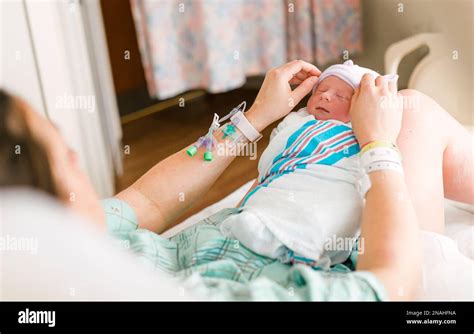 New Mother and Newborn in Hospital Room Stock Photo - Alamy