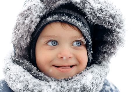 Portrait Of Smiling Baby Boy In A Warm White Snow Suit Stock Photo - Download Image Now - iStock