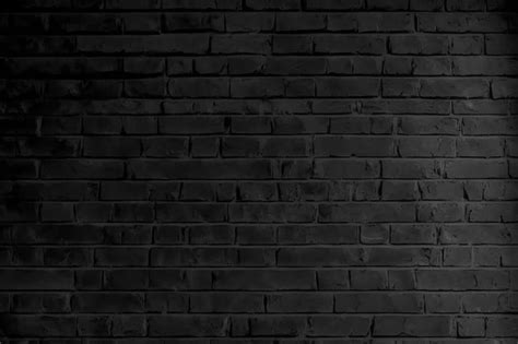 Premium Photo | Black brick wall background with a white text that says ...