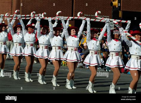 Band of majorettes marching during a Christmas parade Stock Photo - Alamy