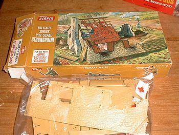 an unopened box with some toys in it sitting on a table next to the package