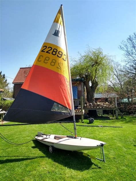 Topper Dinghy plus launch trolley with spare mast, sail, dagger board, and rudder assembly | in ...