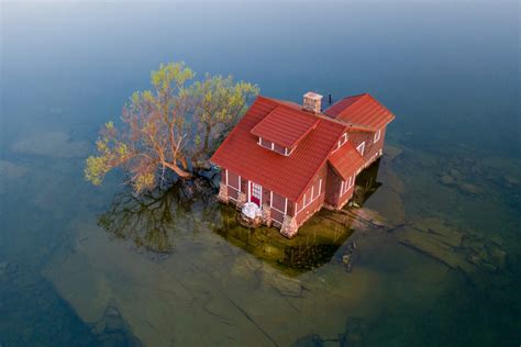 Tiny Island With Red Cottage - Duncan.co